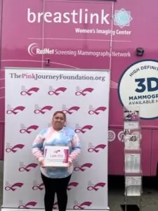 women smiling after free mammogram